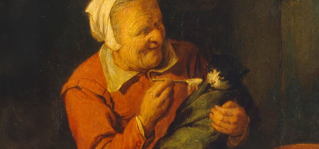 A painting of an old peasant woman feeding a cat with a spoon.