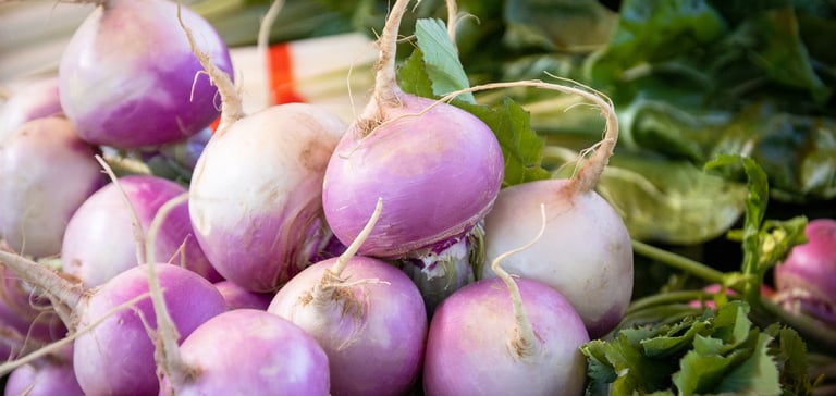 a close up of purple turnips