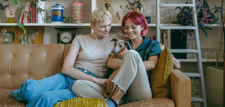 a couple with a dog 
