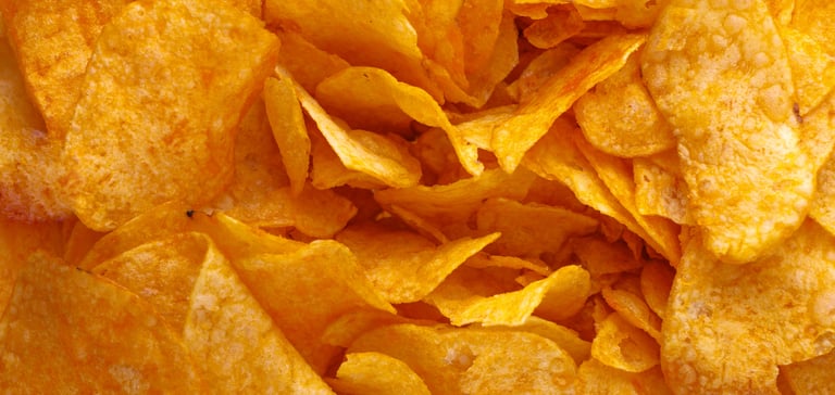 A close up of potato crisps.