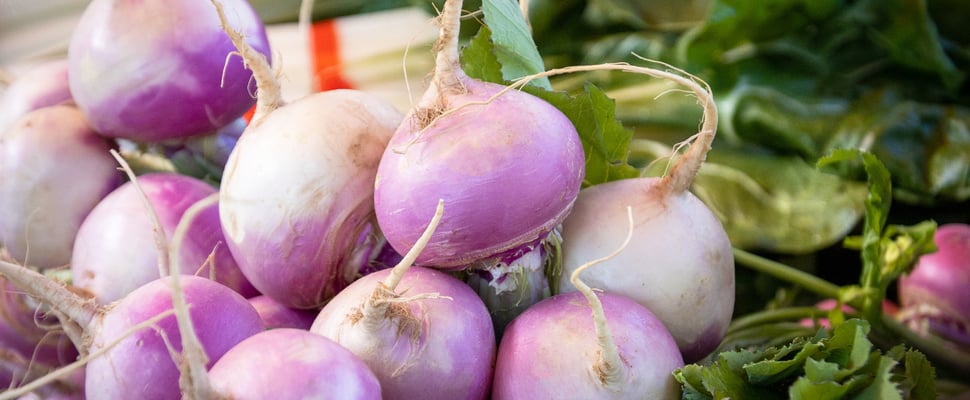 a close up of purple turnips