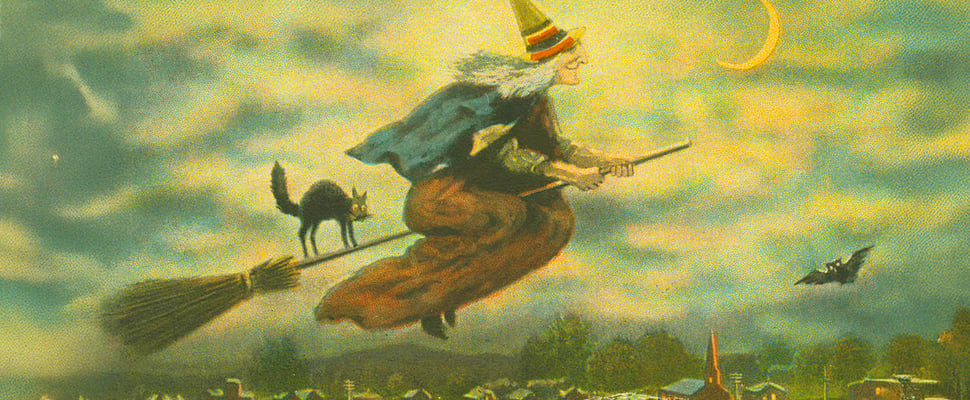 drawing of witch and black cat on a broom