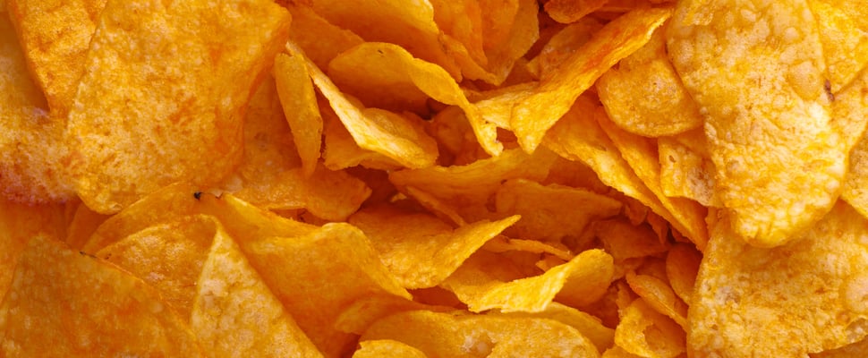 A close up of potato crisps.